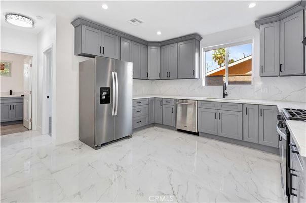 Interior, Kitchen, Marble, Marble Walls, Recessed Lighting, Stainless Steel Appliances