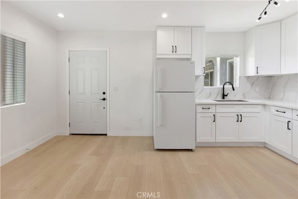 Interior, Kitchen, Marble Walls, Recessed Lighting, Wood Texture Flooring