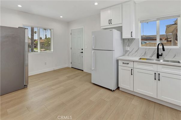 Interior, Kitchen, Marble Walls, Recessed Lighting, Wood Texture Flooring