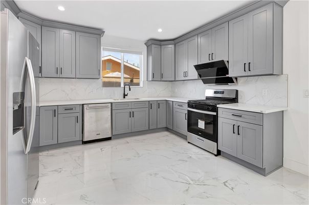 Interior, Kitchen, Marble, Marble Walls, Recessed Lighting, Stainless Steel Appliances