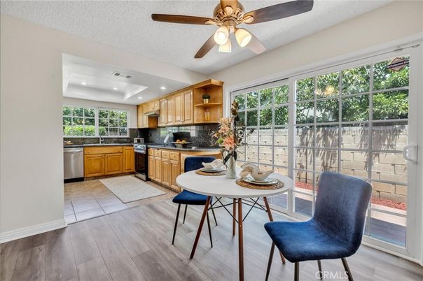 Dining room, Interior, Kitchen, Recessed Lighting, Stainless Steel Appliances, Wood Texture Flooring