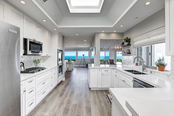 Interior, Kitchen, Recessed Lighting, Stainless Steel Appliances, Water, Wood Texture Flooring