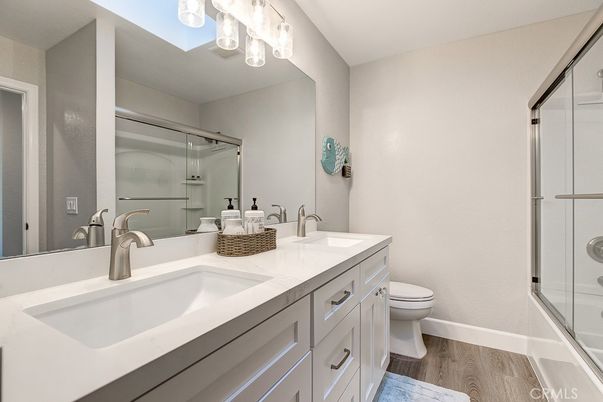 Bathroom, Dual Sink Vanities, Glass Shower, Interior, Wood Texture Flooring