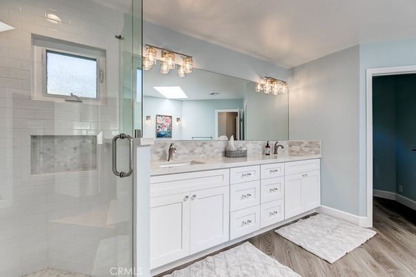 Bathroom, Dual Sink Vanities, Glass Shower, Interior, Wood Texture Flooring