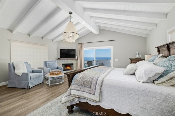 Bedroom, Chandelier, Fireplace, Interior, Living room, Water, Wood Texture Flooring