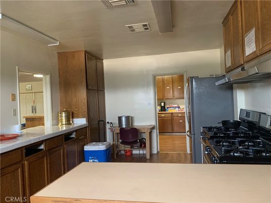 Interior, Kitchen, Tile Countertops, Wood Texture Flooring