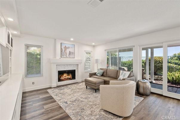 Fireplace, Interior, Living room, Recessed Lighting, Wood Texture Flooring