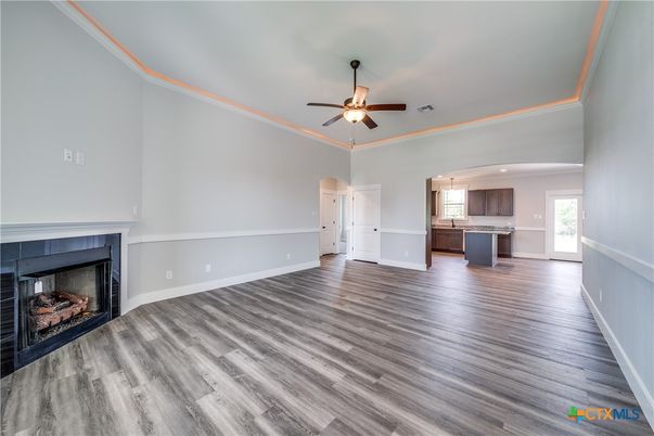 Empty room, Fireplace, Interior, Kitchen, Recessed Lighting, Wood Texture Flooring