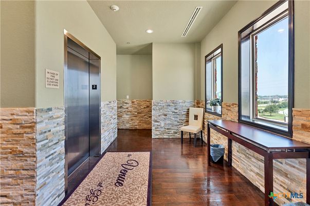 Elevator, Interior, Recessed Lighting, Wood Texture Flooring