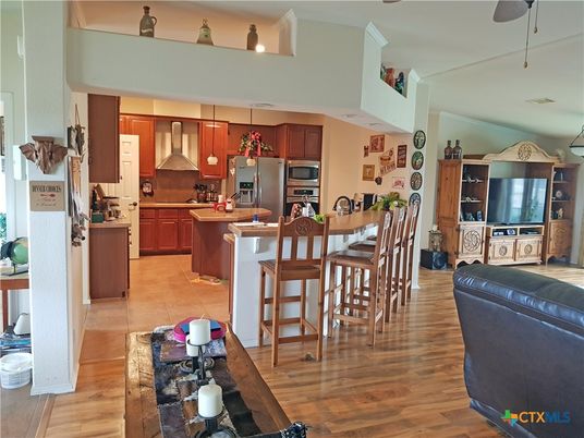 Dining room, Interior, Kitchen, Pendant Lights, Stainless Steel Appliances, Wood Texture Flooring