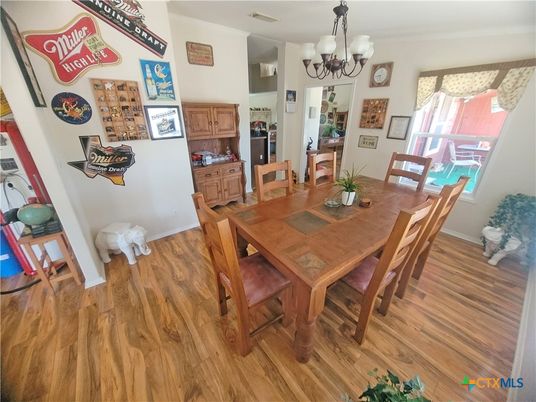 Chandelier, Dining room, Interior, Wood Texture Flooring
