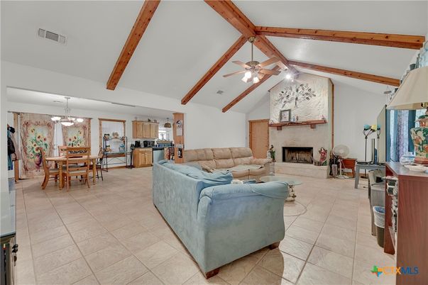 Chandelier, Dining room, Fireplace, Interior, Living room, Pendant Lights, Wooden Beams