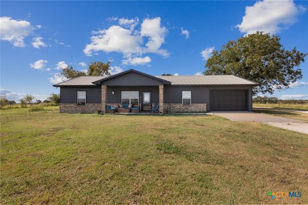 Attached, Backyard, Exterior, Facade, Brick Facade, Ranch