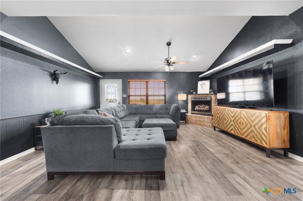 Fireplace, Interior, Living room, Recessed Lighting, Wood Texture Flooring