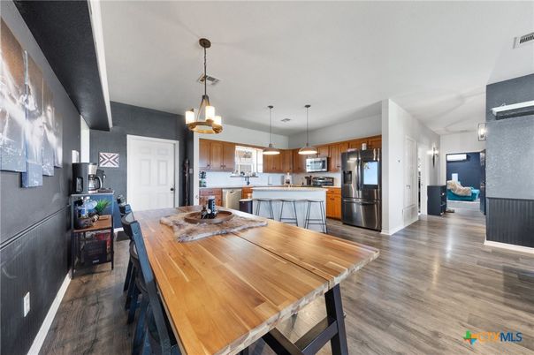 Dining room, Interior, Kitchen, Pendant Lights, Stainless Steel Appliances, Wood Texture Flooring