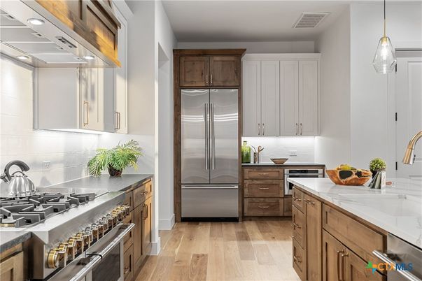 Interior, Kitchen, Pendant Lights, Recessed Lighting, Stainless Steel Appliances, Wood Texture Flooring