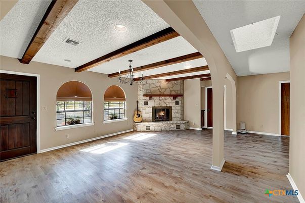 Empty room, Fireplace, Interior, Recessed Lighting, Wooden Beams, Wood Texture Flooring