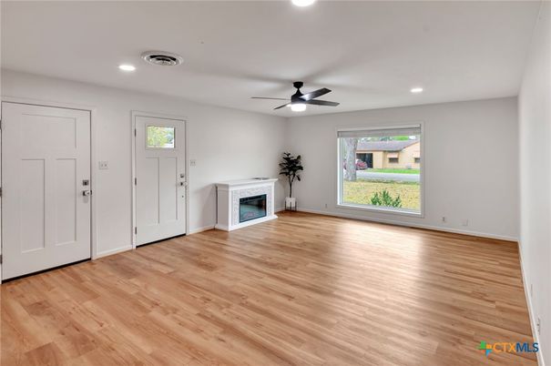 Empty room, Fireplace, Interior, Recessed Lighting, Wood Texture Flooring