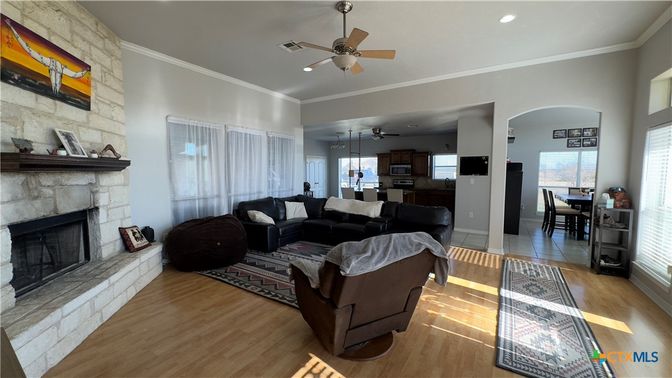 Dining room, Fireplace, Interior, Kitchen, Living room, Recessed Lighting, Stone Walls, Wood Texture Flooring