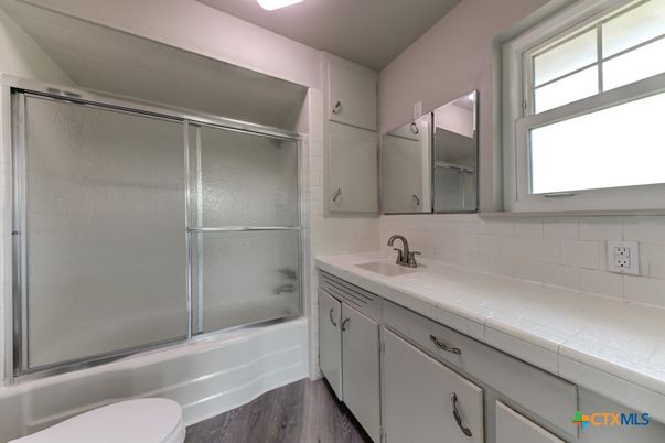 Bathroom, Glass Shower, Interior, Tile Countertops, Wood Texture Flooring