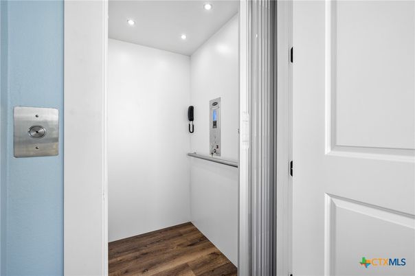Elevator, Interior, Recessed Lighting, Wood Texture Flooring
