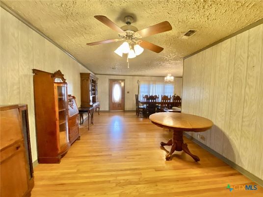 Chandelier, Dining room, Interior, Piano, Wood Texture Flooring