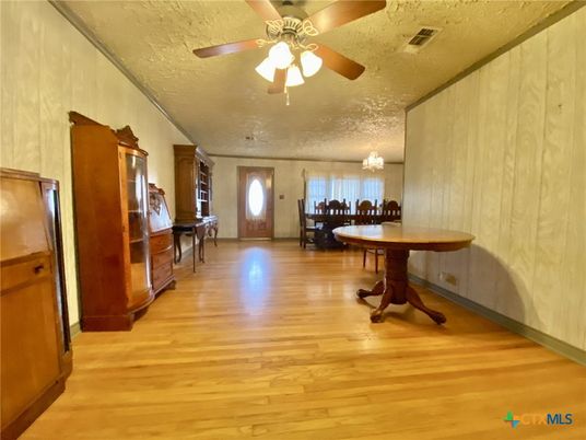 Chandelier, Dining room, Interior, Piano, Wood Texture Flooring