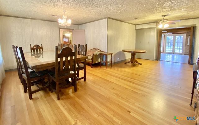 Chandelier, Dining room, Interior, Wood Texture Flooring