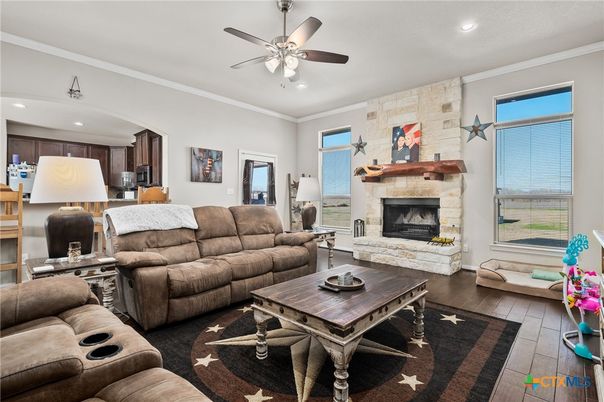 Fireplace, Interior, Kitchen, Living room, Recessed Lighting, Stone Walls, Wood Texture Flooring