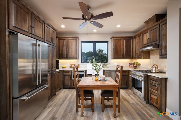 Dining room, Interior, Kitchen, Recessed Lighting, Stainless Steel Appliances, Wood Texture Flooring