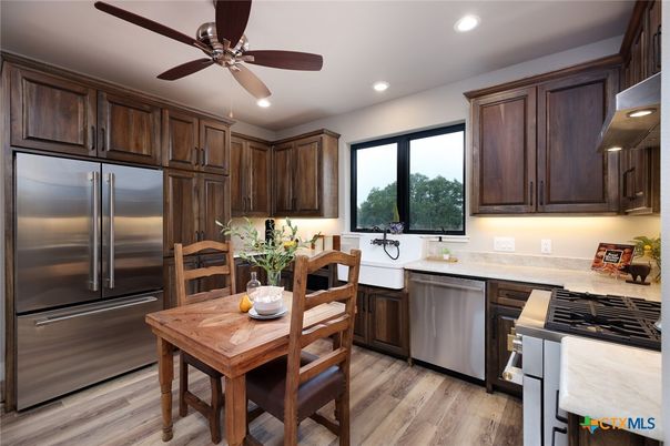 Dining room, Interior, Kitchen, Recessed Lighting, Stainless Steel Appliances, Wood Texture Flooring
