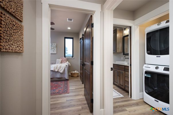 Bathroom, Interior, Recessed Lighting, Utility Closets, Washer, Wood Texture Flooring