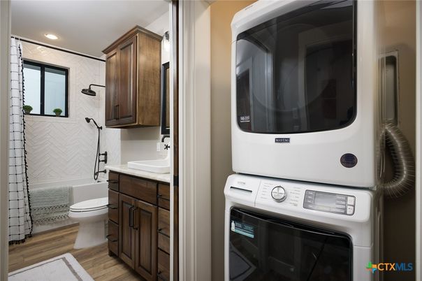 Bathroom, Interior, Recessed Lighting, Utility Closets, Washer, Wood Texture Flooring