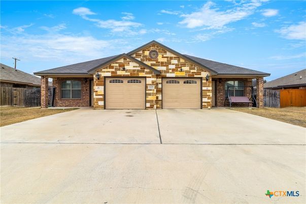 Attached, Exterior, Facade, Brick Facade, Ranch