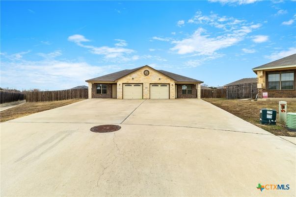 Attached, Backyard, Exterior, Facade, Brick Facade, Ranch