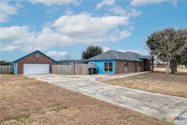 Attached, Backyard, Exterior, Facade, Brick Facade, Ranch