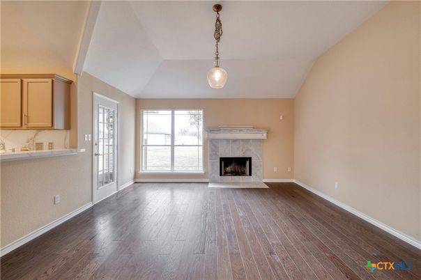 Empty room, Fireplace, Interior, Pendant Lights, Wood Texture Flooring