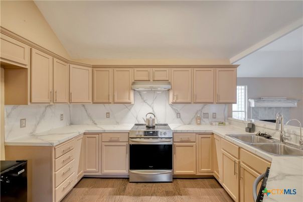Interior, Kitchen, Marble Walls, Stainless Steel Appliances, Wood Texture Flooring
