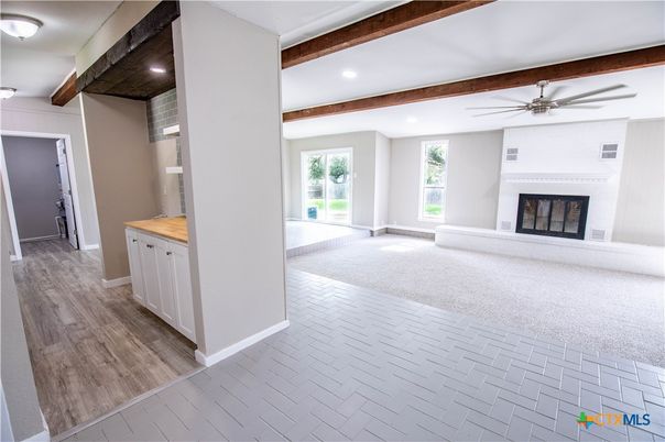 Empty room, Fireplace, Interior, Recessed Lighting, Wooden Beams, Wood Texture Flooring