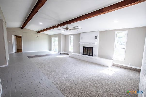 Empty room, Fireplace, Interior, Recessed Lighting, Wooden Beams