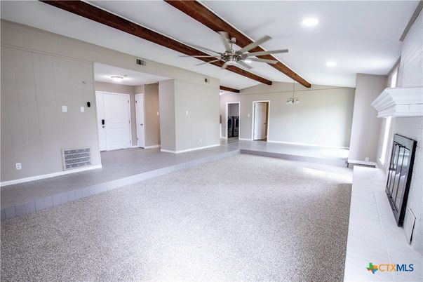 Empty room, Fireplace, Interior, Recessed Lighting, Wooden Beams