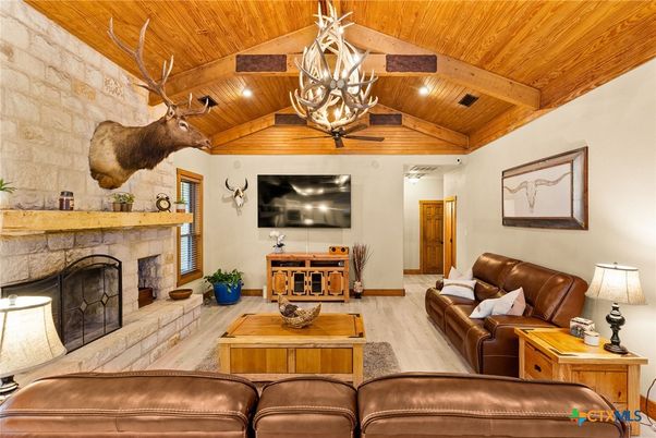 Fireplace, Interior, Living room, Recessed Lighting, Stone Walls, Wooden Beams, Wooden Ceilings, Wood Texture Flooring