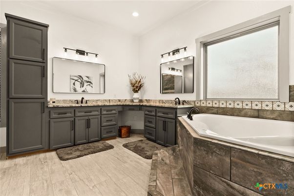 Bathroom, Dual Sink Vanities, Interior, Recessed Lighting, Wood Texture Flooring