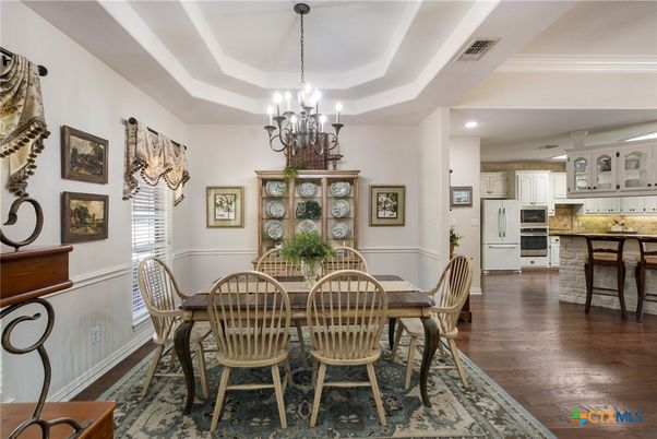 Chandelier, Dining room, Interior, Kitchen, Recessed Lighting, Stainless Steel Appliances, Wood Texture Flooring