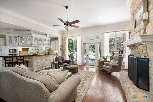 Fireplace, Interior, Kitchen, Living room, Recessed Lighting, Wood Texture Flooring