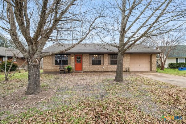 Attached, Backyard, Exterior, Facade, Brick Facade, Ranch