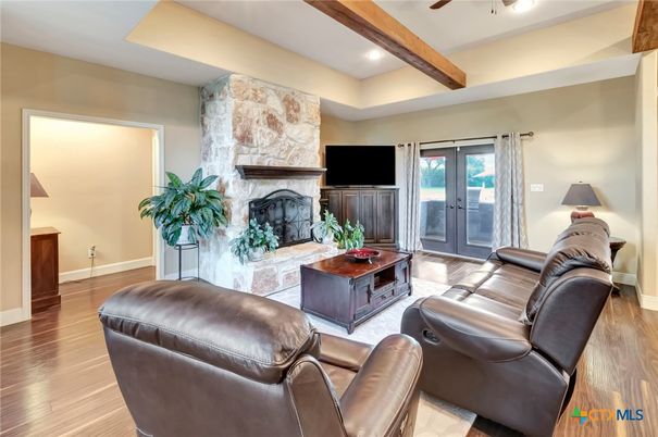 Fireplace, Interior, Living room, Recessed Lighting, Stone Walls, Wooden Beams, Wood Texture Flooring