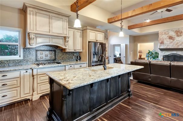 Fireplace, Interior, Kitchen, Living room, Pendant Lights, Recessed Lighting, Wooden Beams, Wood Texture Flooring