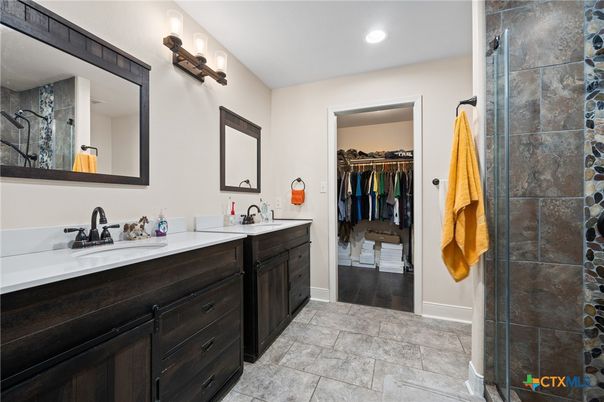 Bathroom, Dual Sink Vanities, Interior, Recessed Lighting, Walk-in Closets, Wood Texture Flooring