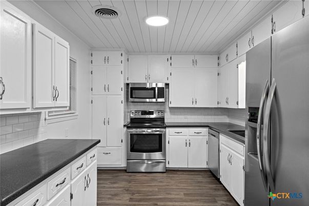 Interior, Kitchen, Recessed Lighting, Stainless Steel Appliances, Wood Texture Flooring